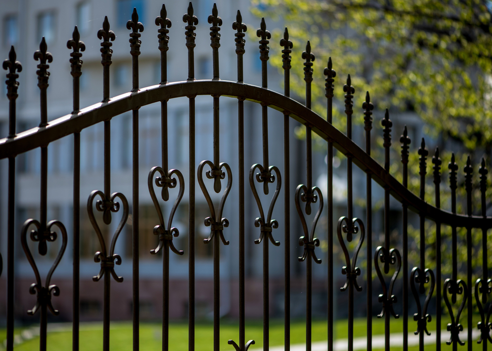 wrought iron fence costs thickness